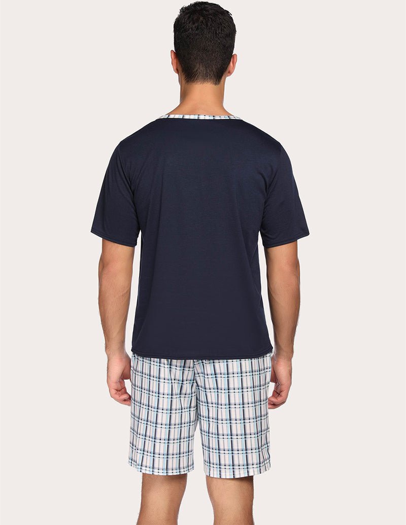 Men's navy short-sleeve pajama top (back) with blue plaid sleep shorts