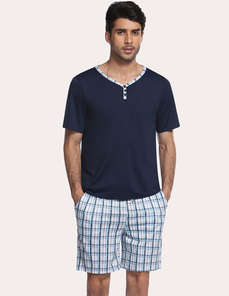 Men's navy henley pajama top with blue plaid sleep shorts, drawstring waist