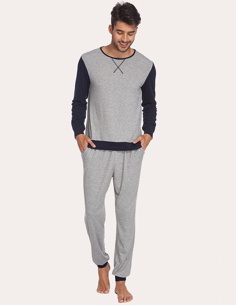 Men's two-piece pajama set front view: light grey raglan top with navy sleeves