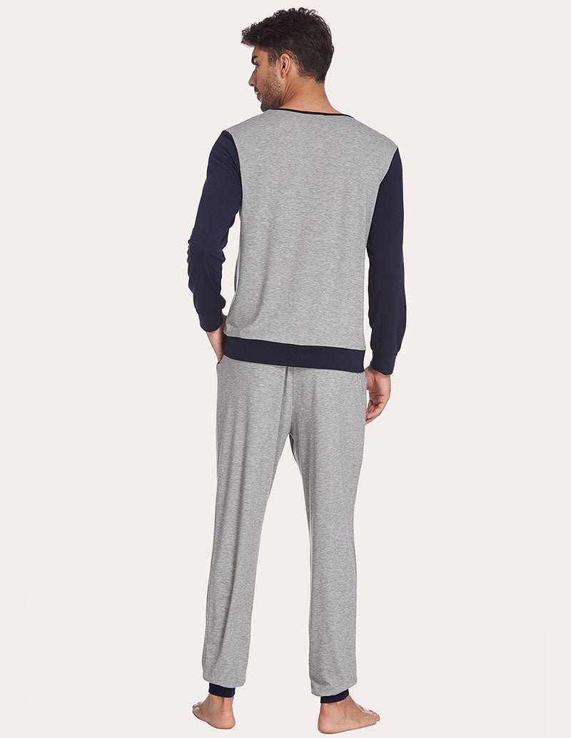 Men's two-piece pajama set back view: light grey top with navy sleeves and cuffed jogger pants