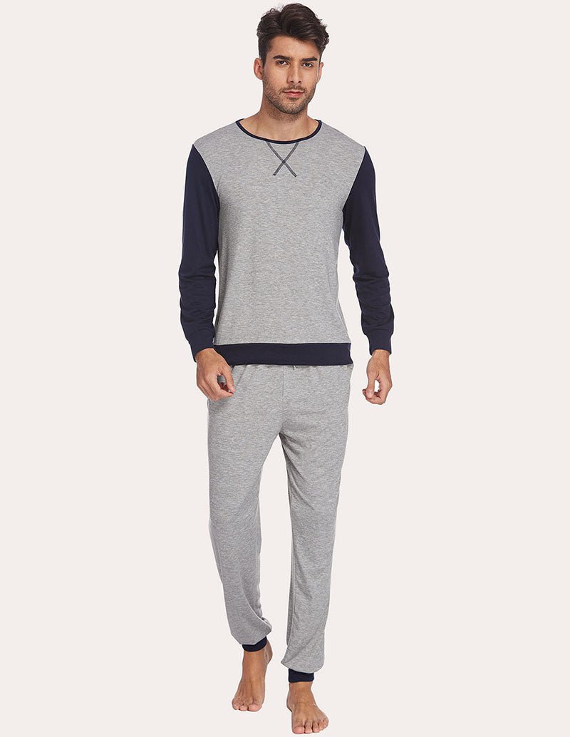 Men's two-piece pajama set with light grey raglan long-sleeve top and drawstring jogger pants