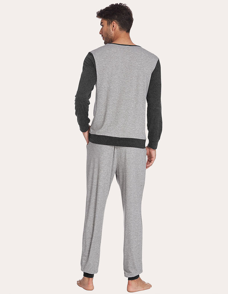 Men's two-piece pajama set, back view: light grey top with navy sleeves and matching pants