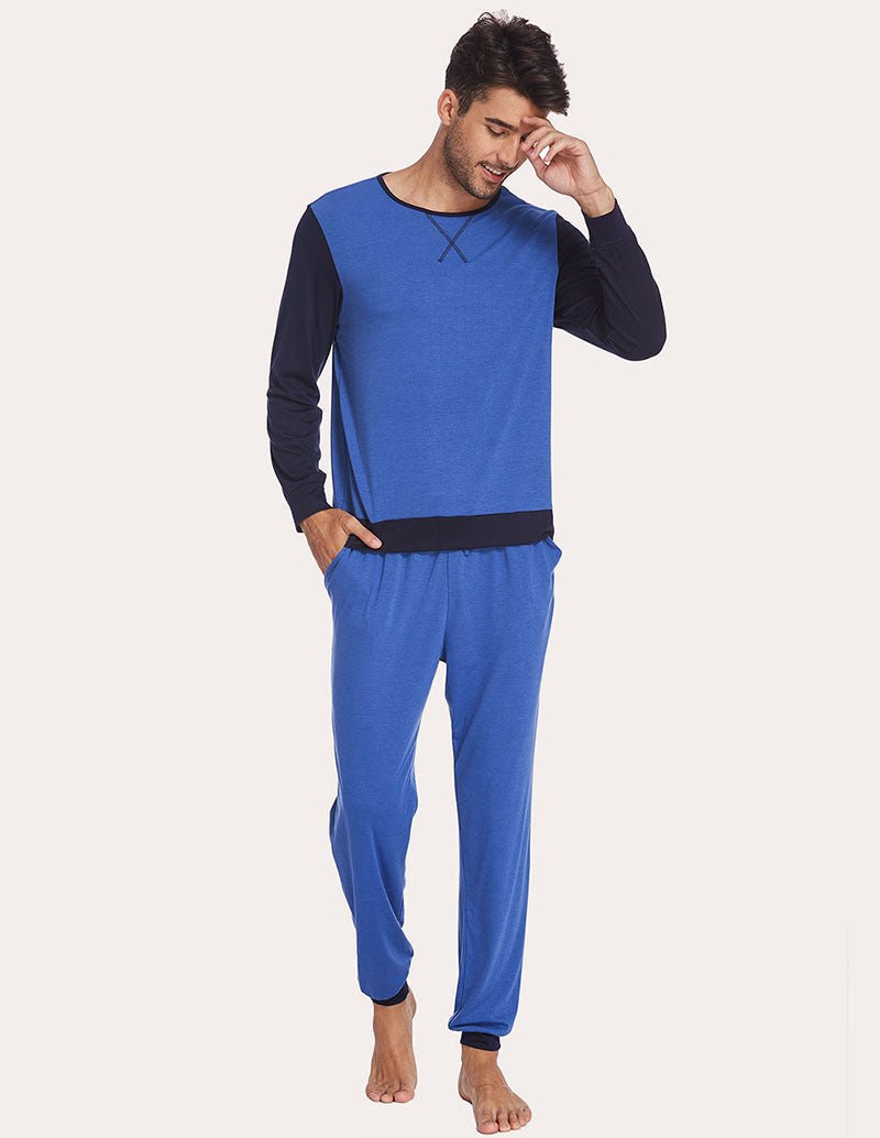 Men's blue two-piece pajama set with long-sleeve top and tapered jogger pants