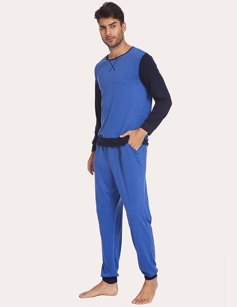 Men's blue two-piece pajama set in side view, long sleeves and jogger pants