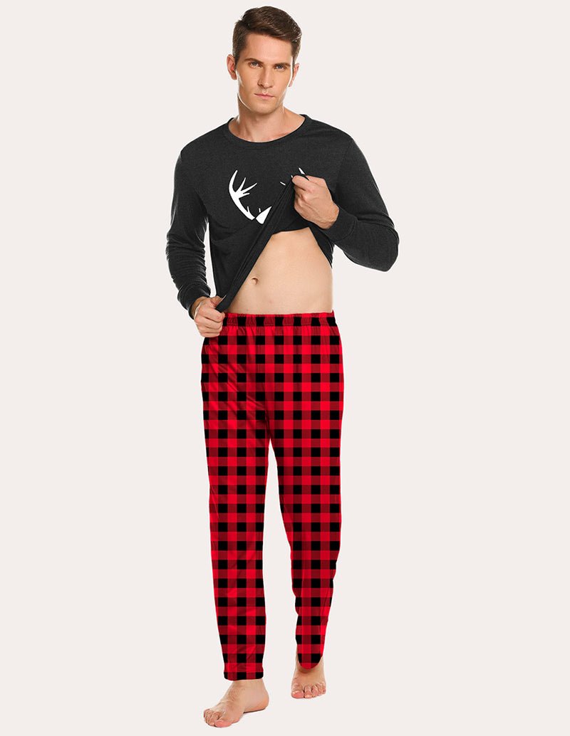 Men's pajama set with dark long-sleeve top and red plaid pants, deer emblem