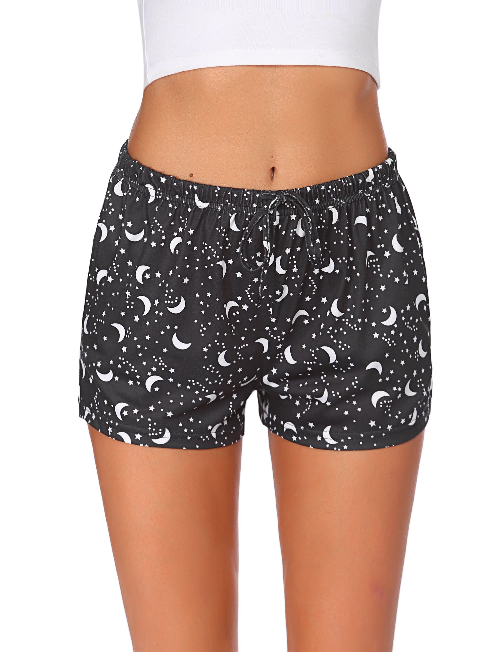 Black pajama shorts with allover moons and stars print, gathered elastic waistband