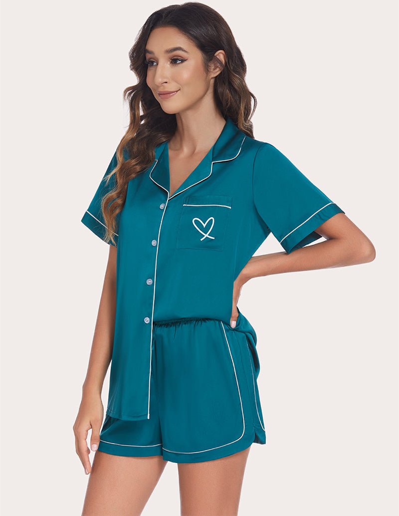 Women's teal button-front pajama set with contrast trim and drawstring waist shorts