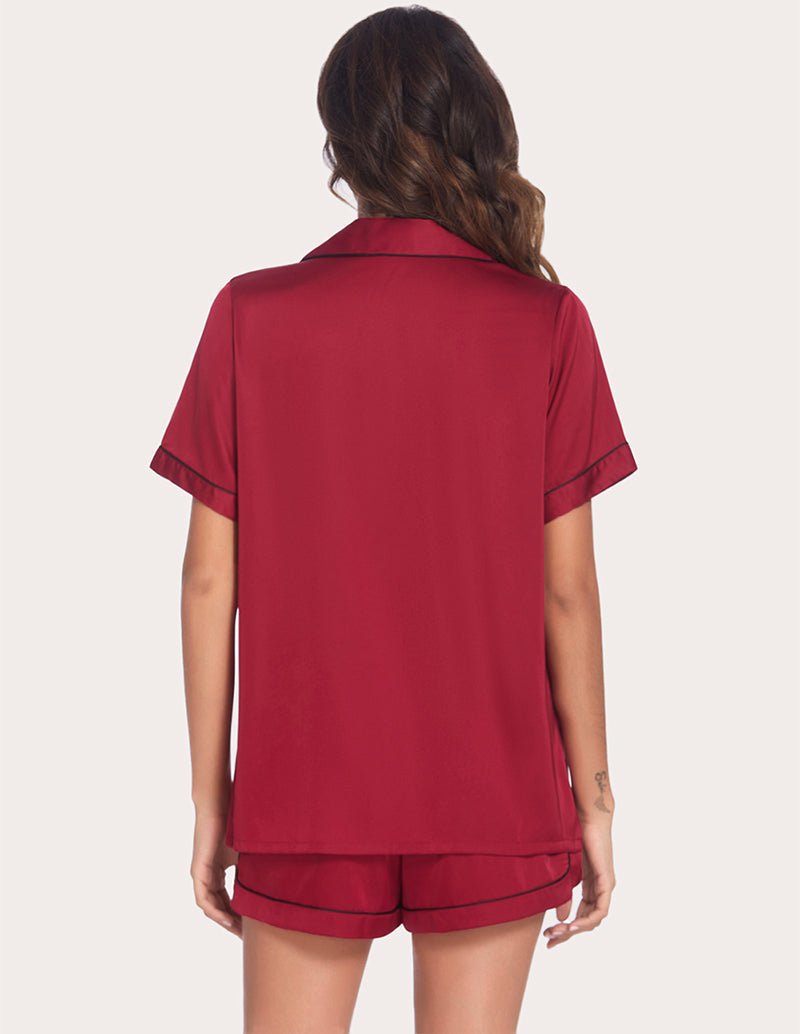 Wine red satin pajama set, back view: short-sleeve button top and matching shorts