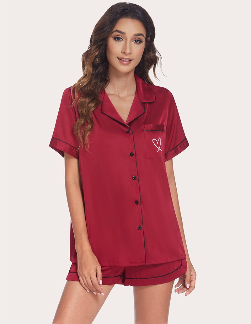 Wine red satin pajama set with short-sleeve button top, collar, and matching shorts