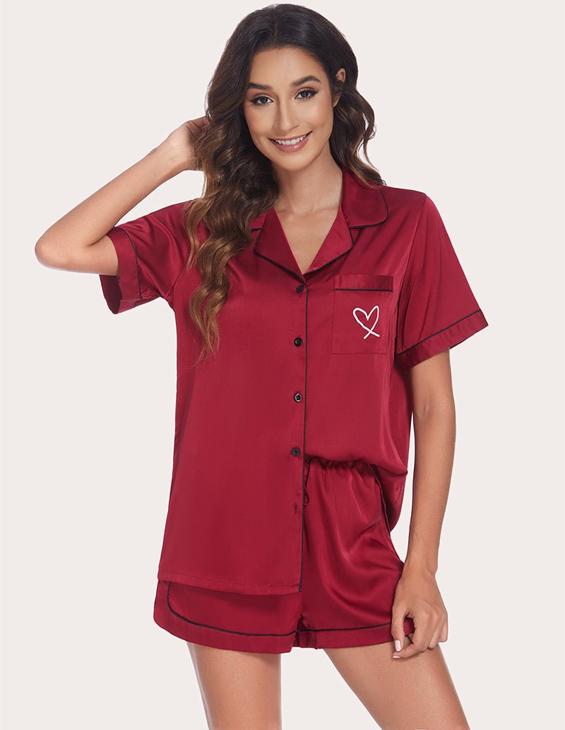 Wine red satin pajama set with pointed collar, button-up top and elastic-waist shorts