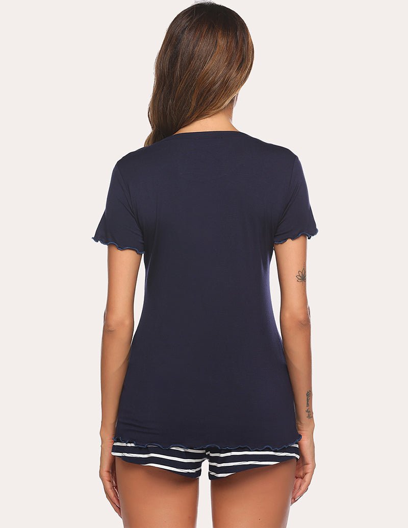 Navy blue pajama set back view: short-sleeve tee with striped boxer shorts hem