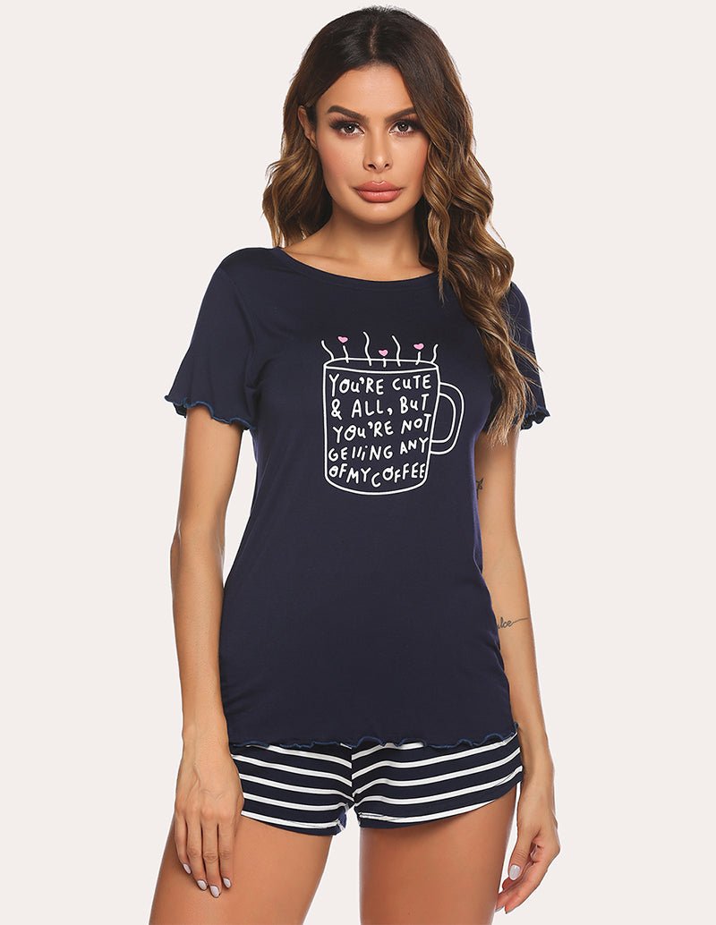 Navy blue pajama set with coffee quote graphic short-sleeve tee and striped shorts
