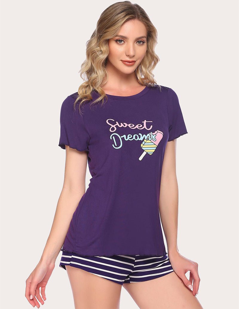 Purple pajama set with Sweet Dreams graphic T-shirt and striped shorts, front view