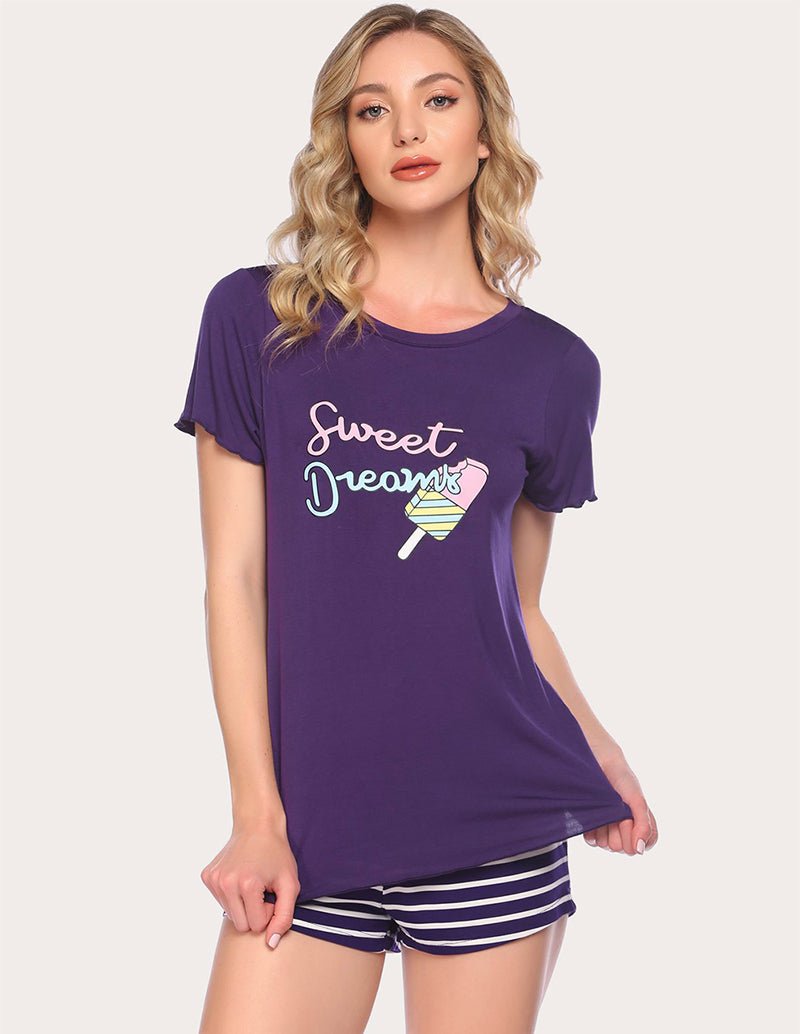 Purple pajama set with Sweet Dreams graphic T-shirt and striped shorts