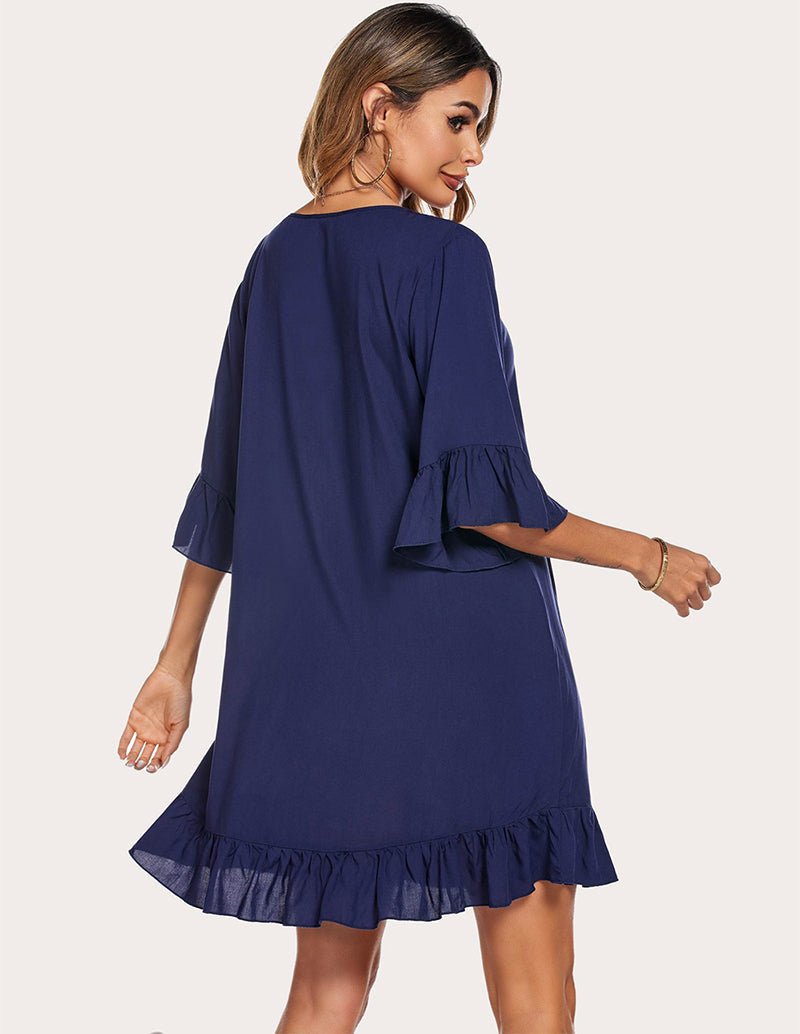 Navy blue ruffled hem sleep dress, back view with gathered cuffs and flared skirt