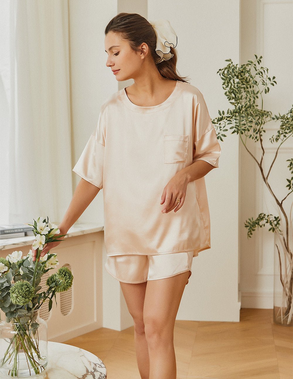 Champagne satin pajama set: loose short-sleeve top with chest pocket and matching shorts