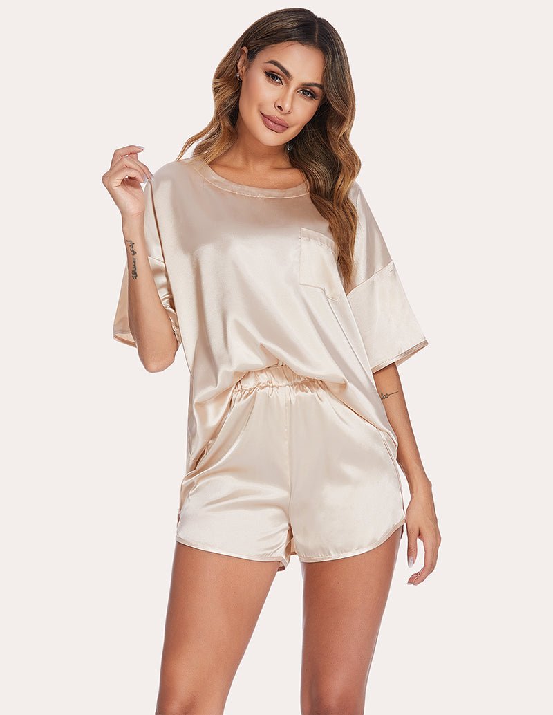 Champagne satin pajama set with short-sleeve top and matching elastic-waist shorts