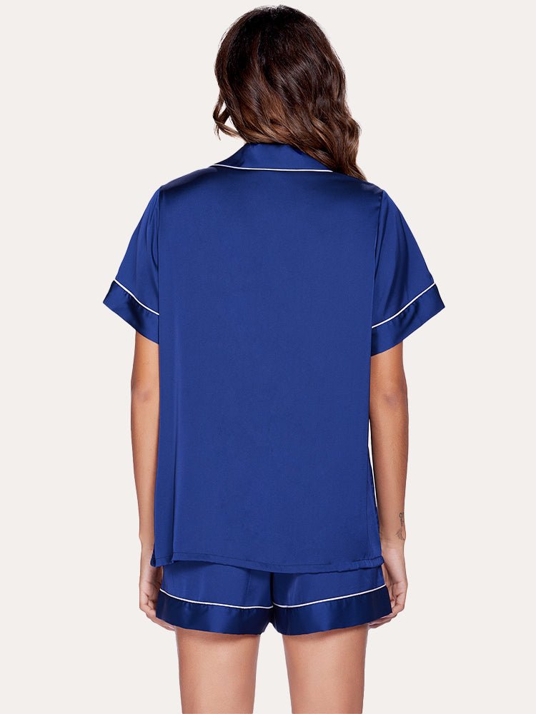 Navy blue satin pajama top and elastic waist shorts, back view