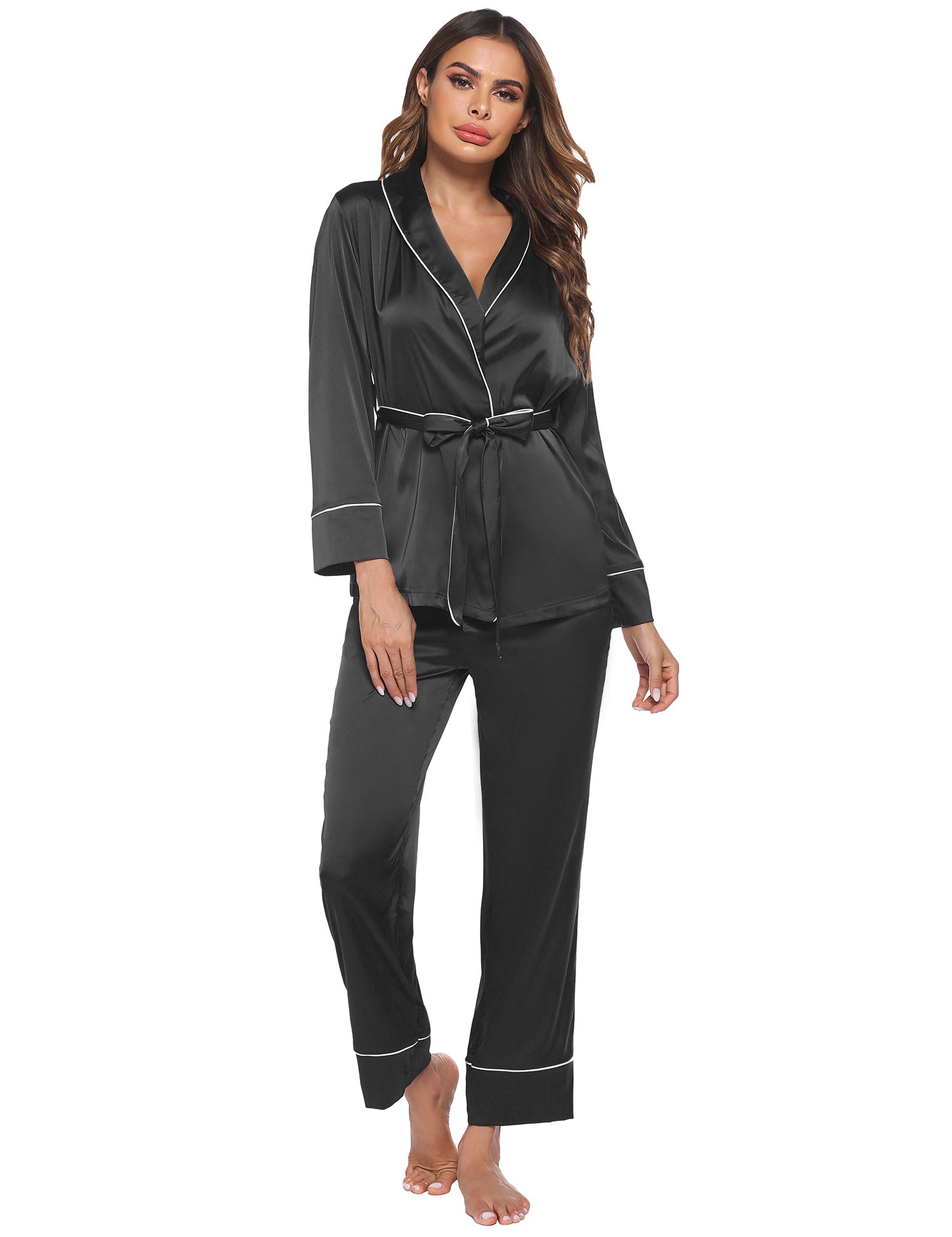 Black satin pajama set with long sleeves, V-neck piping, and matching drawstring pants