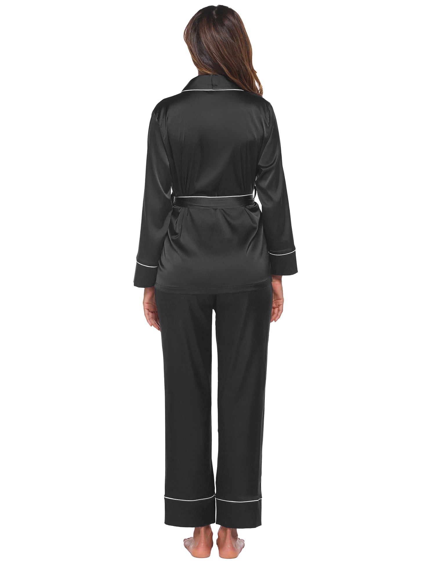 Back view: black satin long-sleeve pajama set with waist tie and cuffed pants