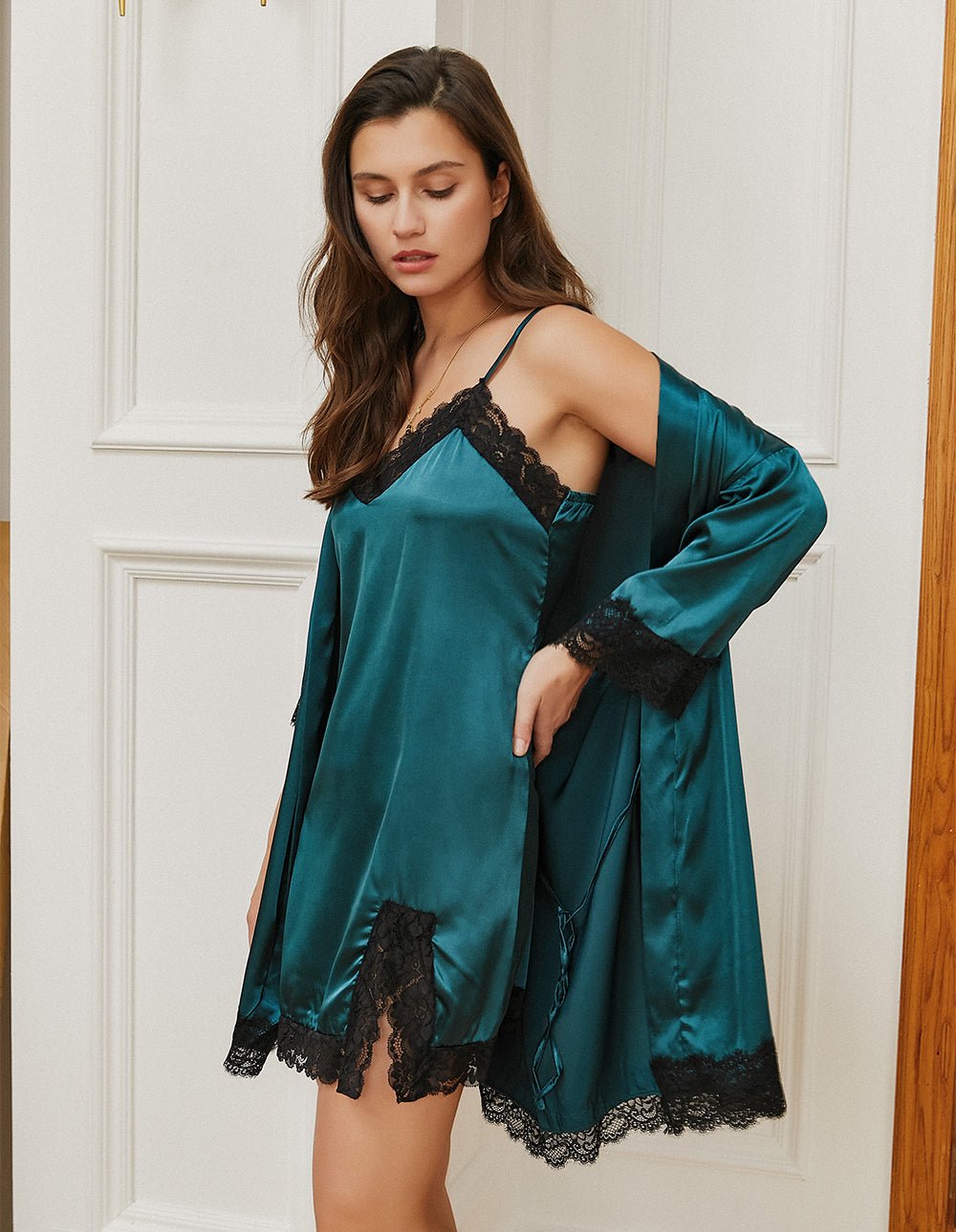 Teal satin nightdress with black lace trim, side view