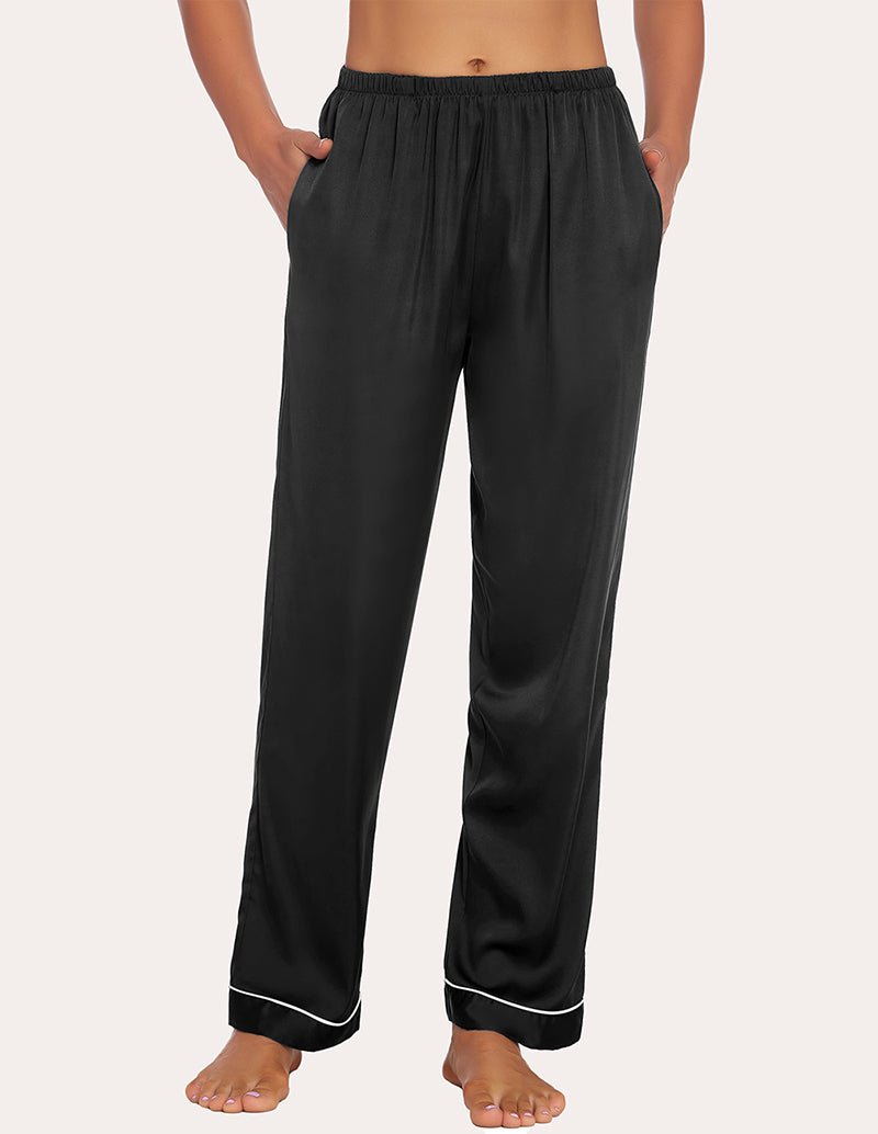 Black satin pajama pants with elastic waistband and contrast-trimmed cuffs