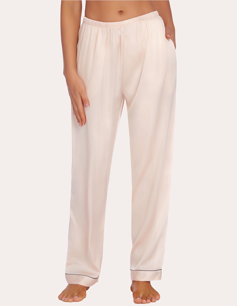 Light cream satin pajama pants with elastic waistband and contrast piping at cuffs