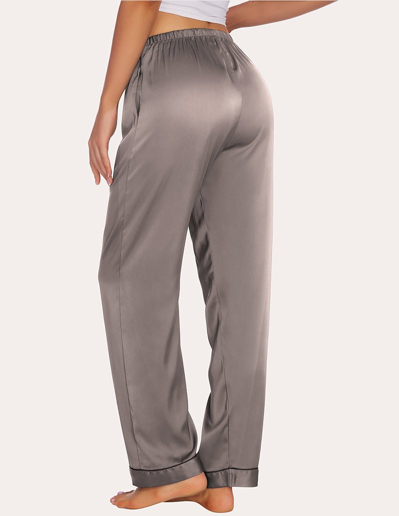 Taupe satin pajama pants with elastic waist and relaxed straight legs; cuffed hems.
