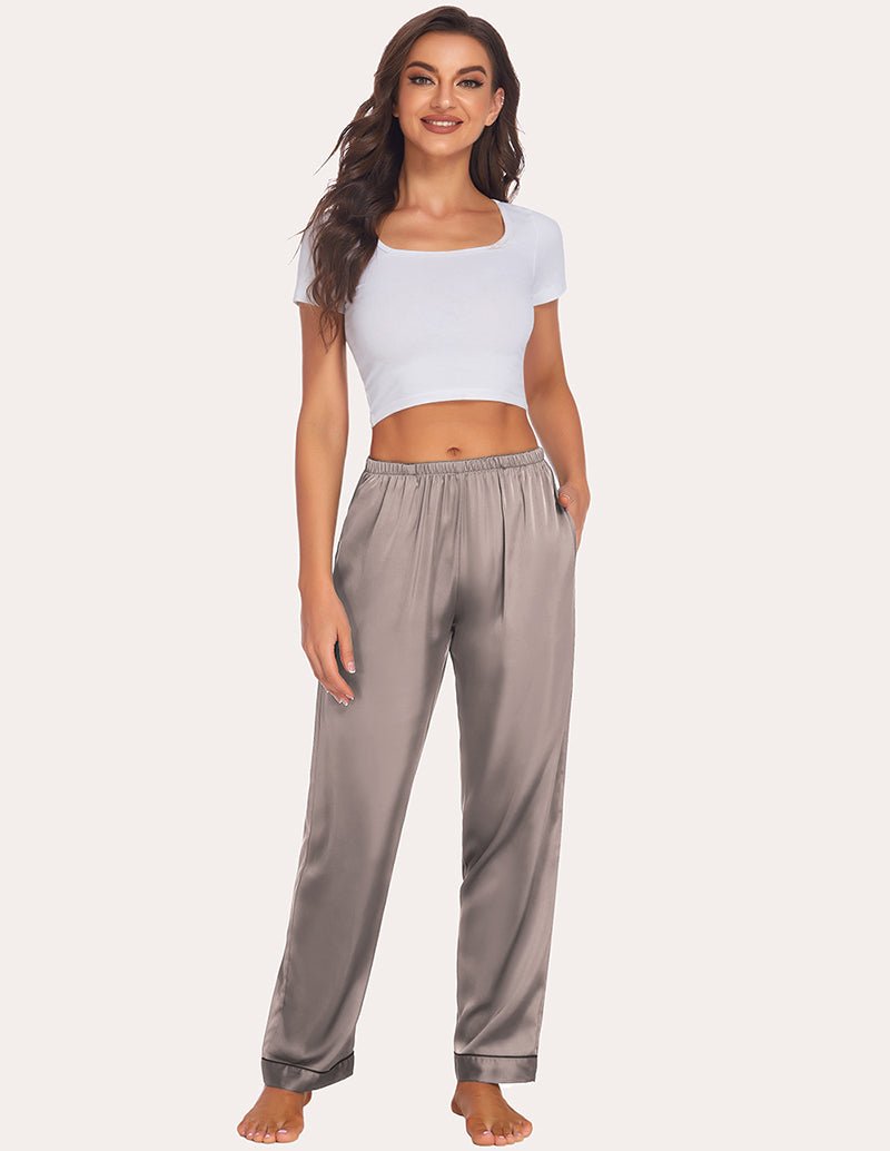 Satin pajama pants in taupe with elastic waistband and relaxed straight fit; cuffed hem.