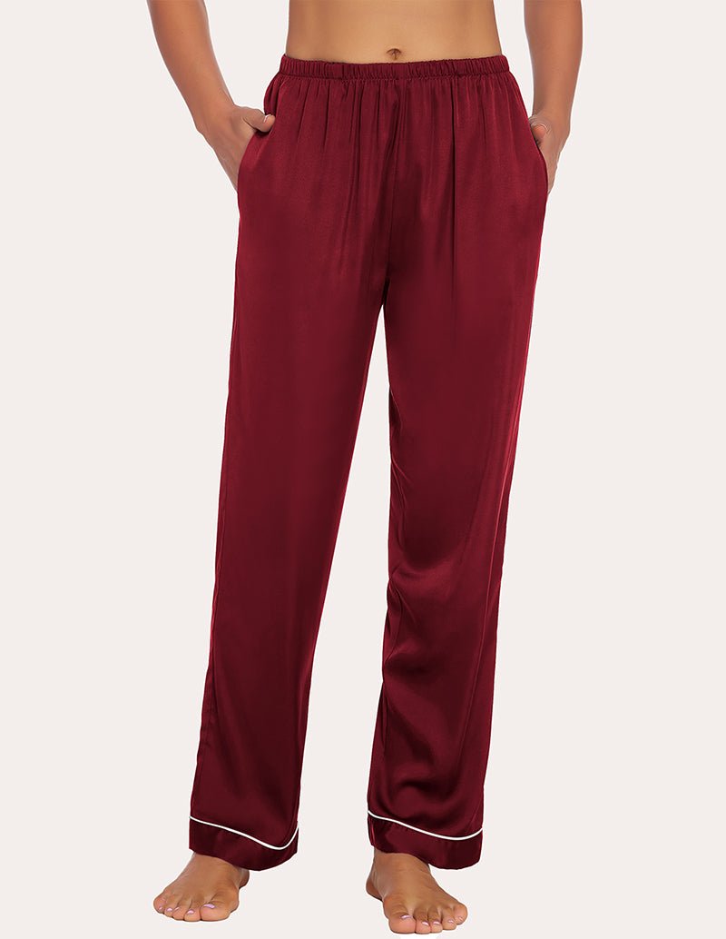 Wine-red satin pajama pants with gathered elastic waistband and contrast cuffs