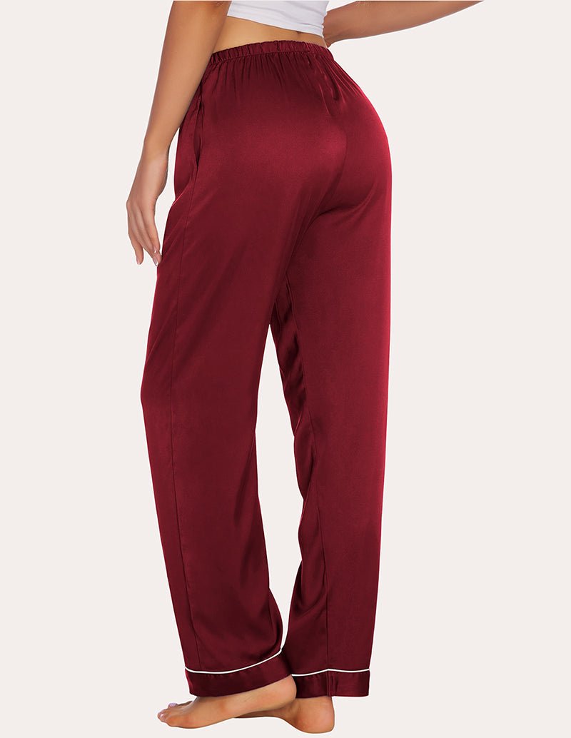Wine-red satin pajama pants with elastic waist, contrast piping at cuffs