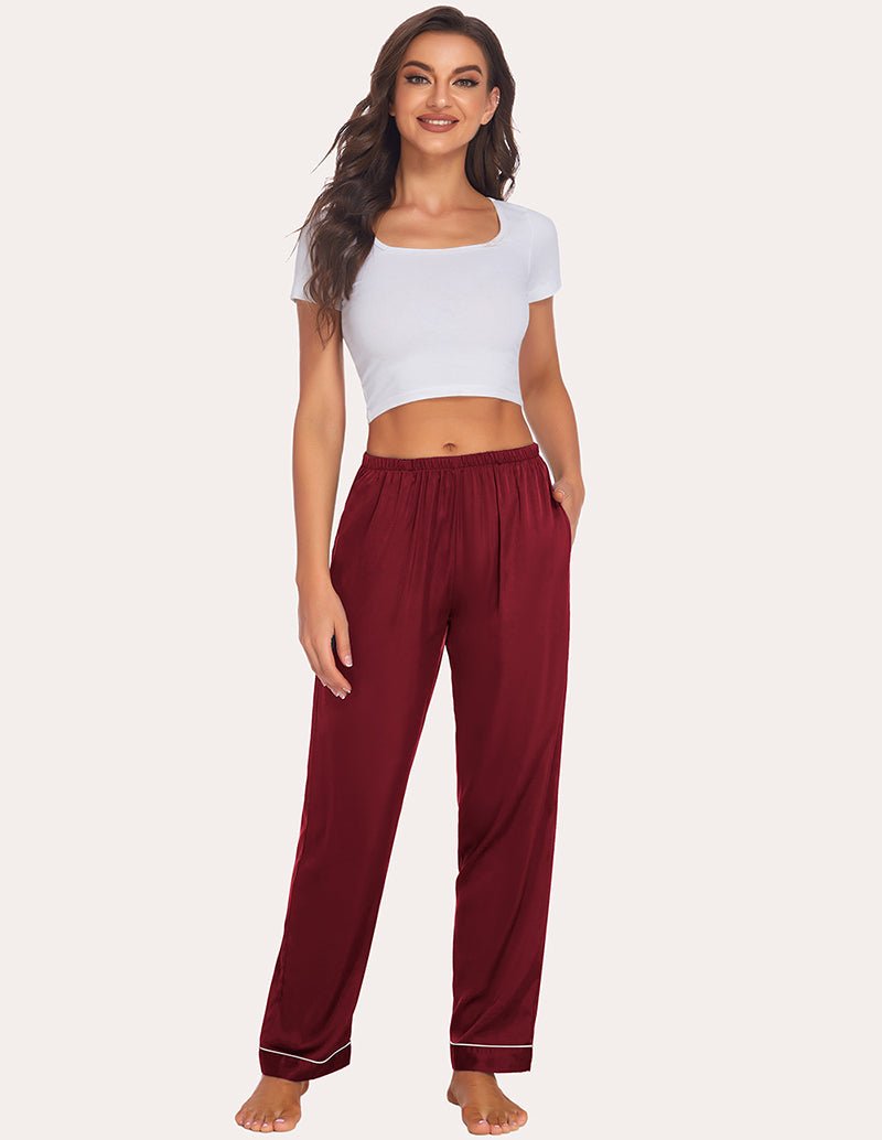 Wine-red satin pajama pants with elastic drawstring waist and contrast piping