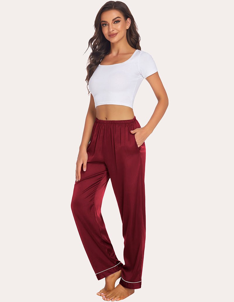 Wine-red satin pajama pants with elastic waistband and contrast-trim hem cuffs