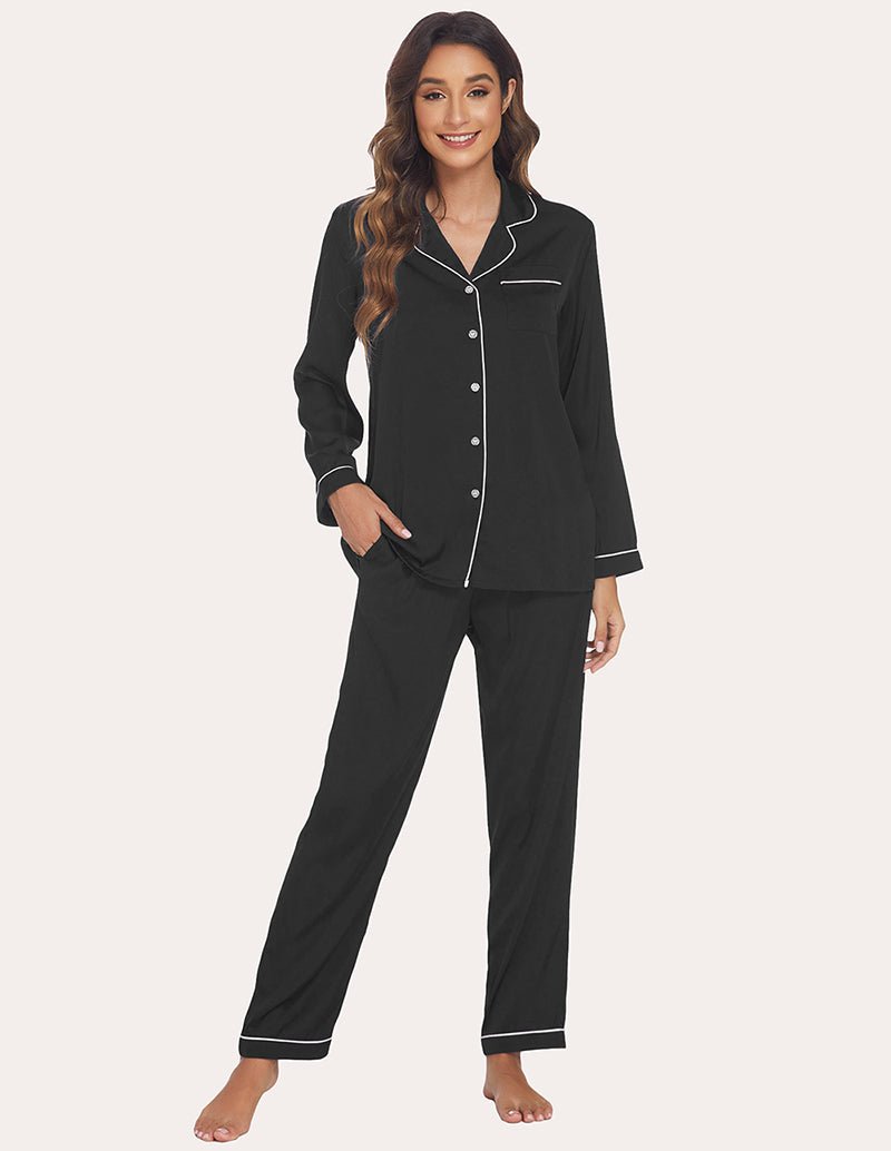 Black satin button-up pajama shirt with contrast trim and matching pants