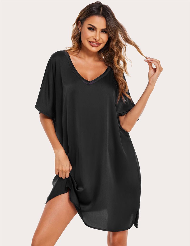 Black satin silk night dress with V-neck and short draped sleeves, curved hem
