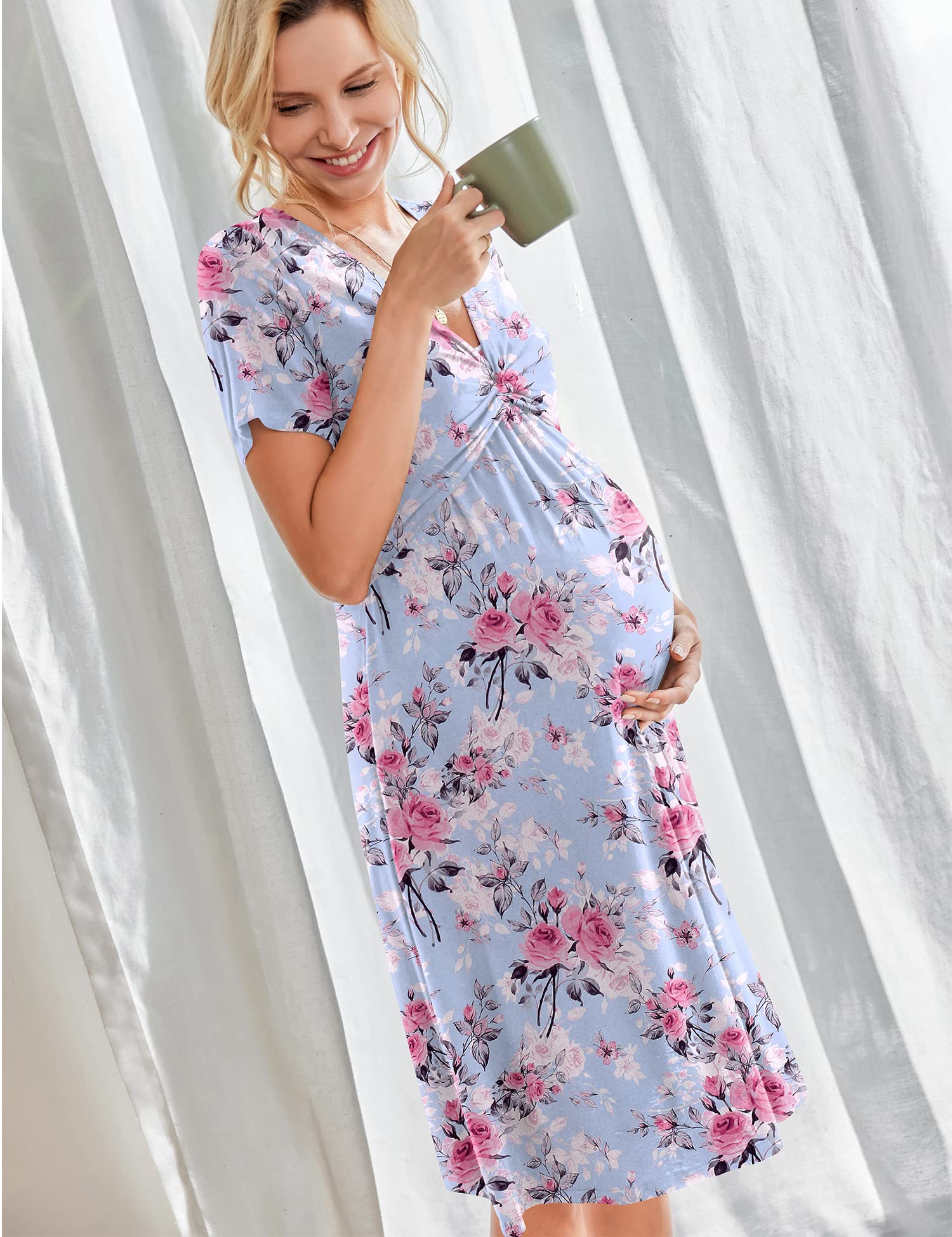 Maternity nursing dress with short sleeves, V-neck, and pink floral print on light blue
