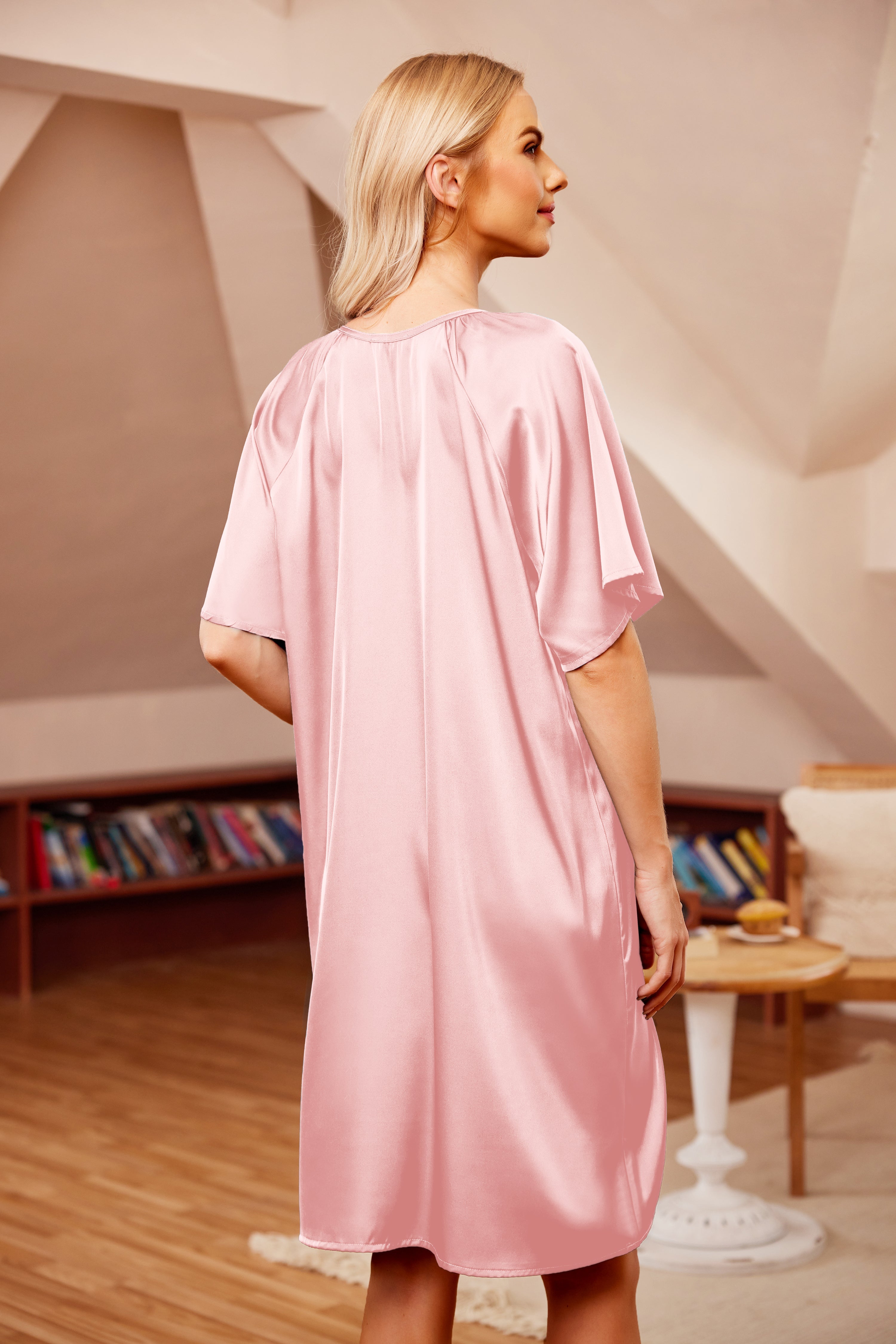 Light pink silk short-sleeve loose sleepwear dress from back view, relaxed fit