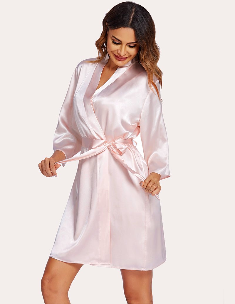 Champagne satin robe with tied waist over slip nightdress, lace V-neck