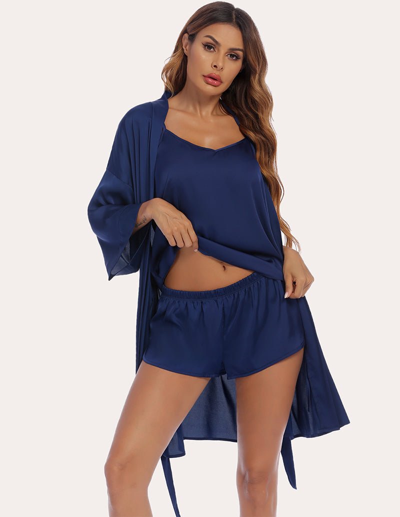Navy silk satin cami and shorts set with robe draped open