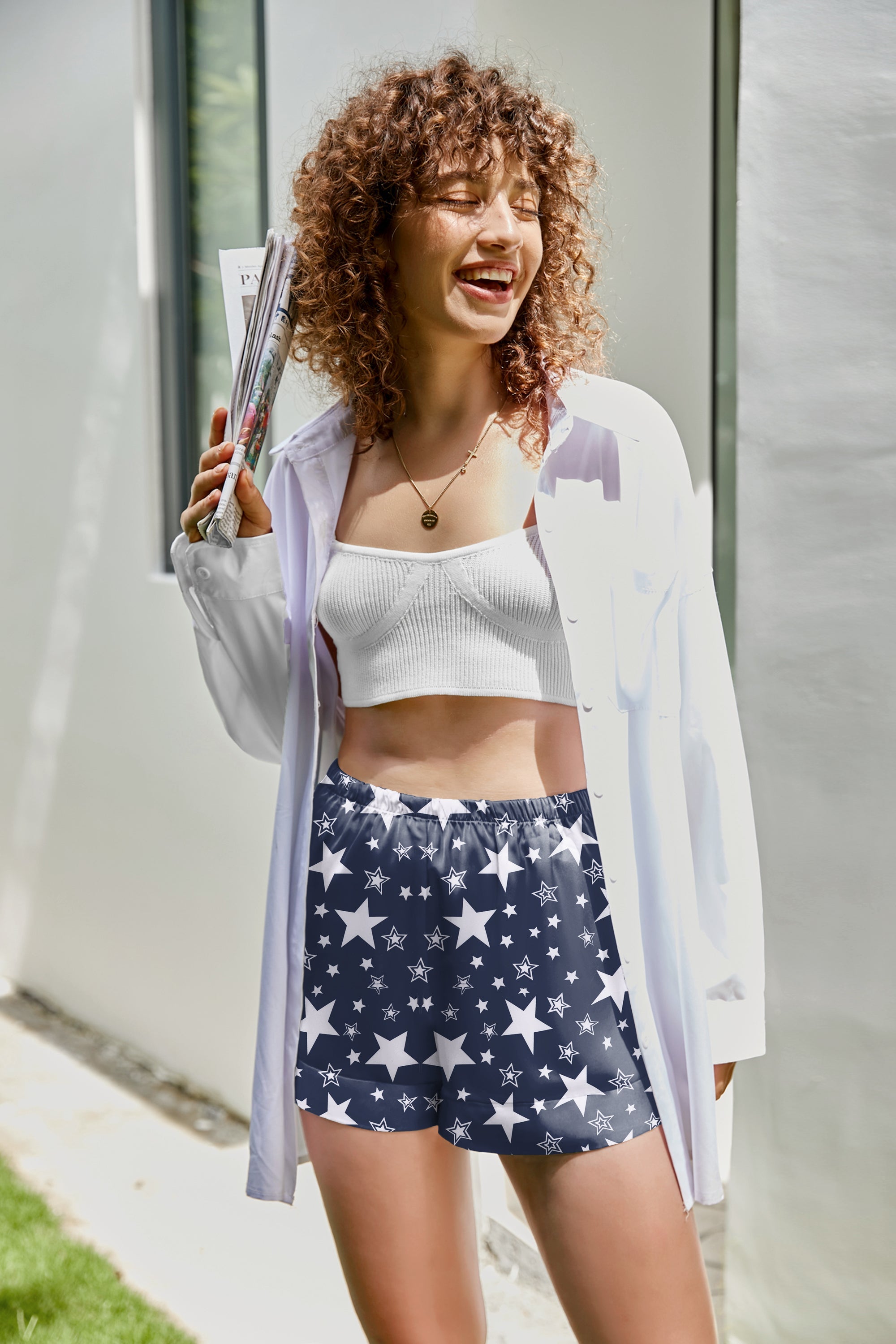 Silk satin pajama shorts in navy with white star print, elastic waist