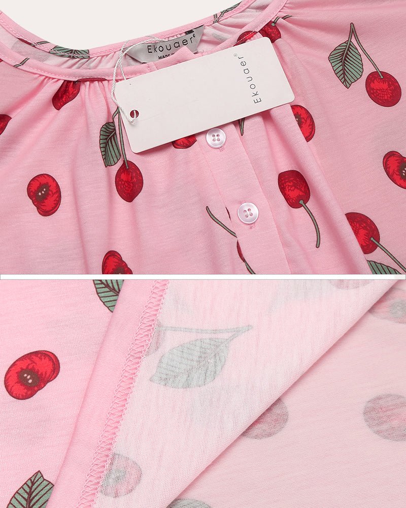 Pink printed sleepwear nightgown fabric close-up with button placket and brand tag