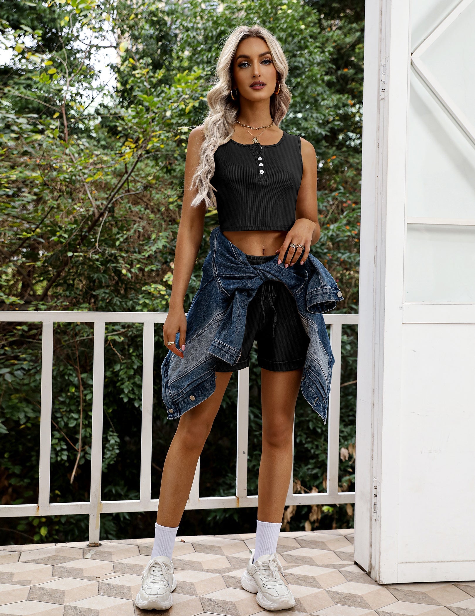 Black sleeveless crop pajama set with button placket top and drawstring shorts