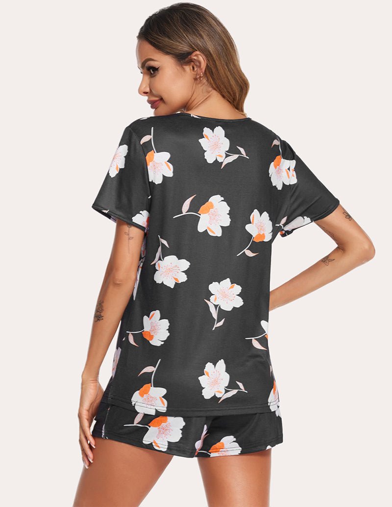 Black nursing pajama set with floral print short-sleeve top and drawstring shorts, back view