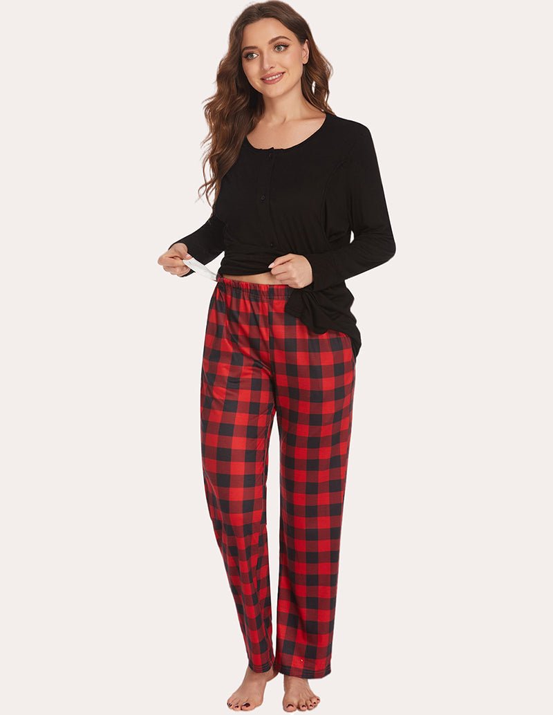 Black long-sleeve pajama top with red-and-black plaid pajama pants and elastic waistband