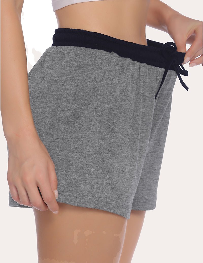 Heather grey pajama shorts with elastic waistband and black drawstring tie