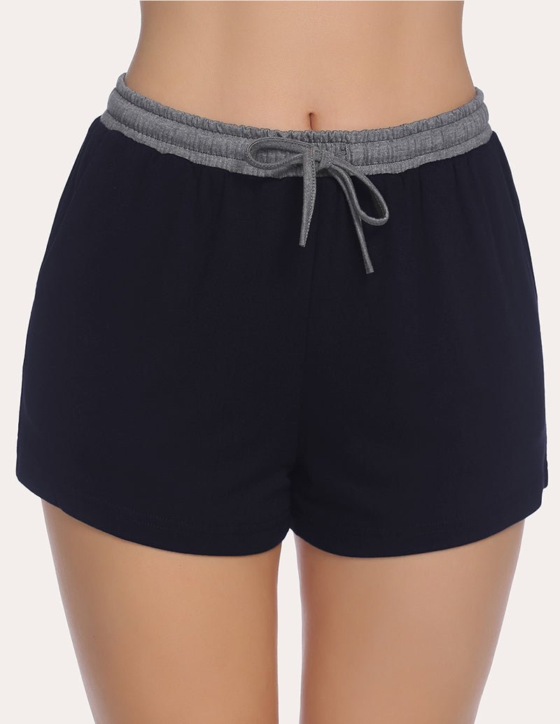 Dark navy pajama shorts with elastic waist, light grey drawstring ties