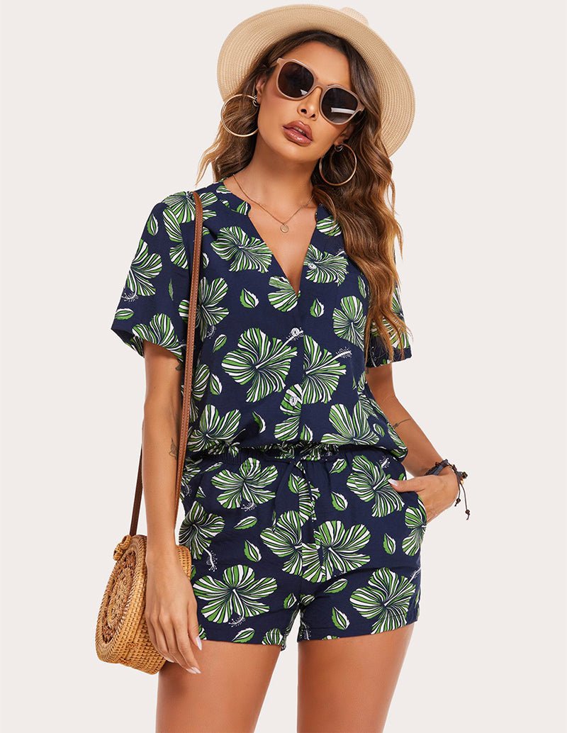 Navy and green tropical leaf print pajama top with front buttons and matching shorts