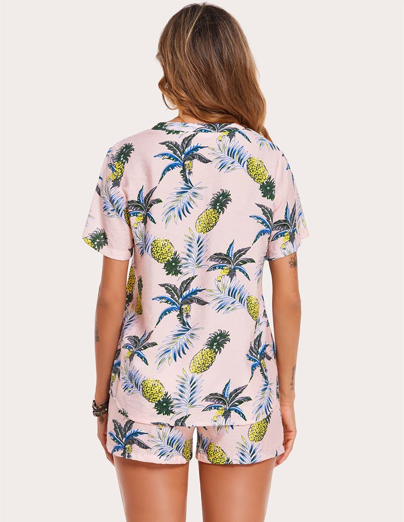 Rückansicht Pyjama-Set: rosafarben mit durchgehendem Ananas- und Blätterprint