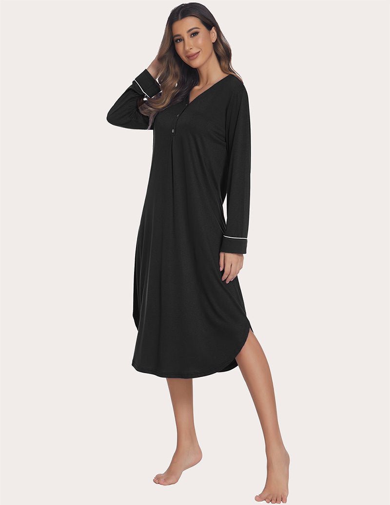 Black soft ribbed knit nightgown, long sleeves with white cuff trim, side view.