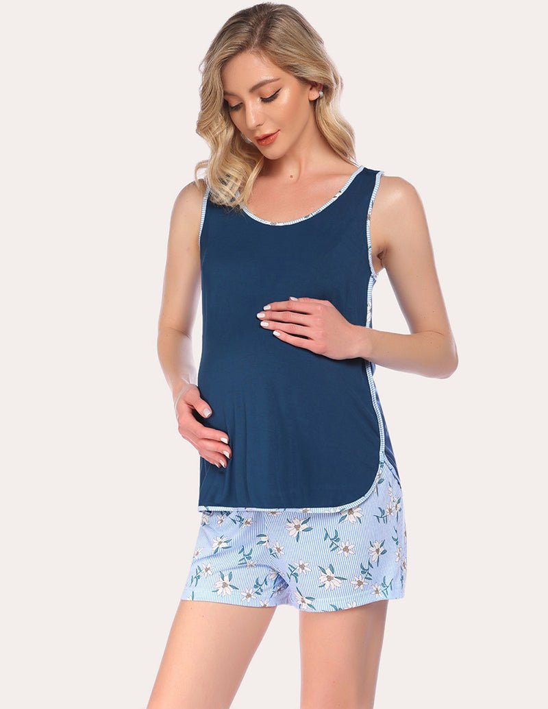 Maternity pajama set with navy nursing tank and light floral shorts, relaxed front view